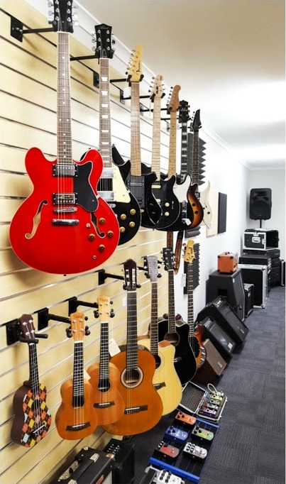 Guitar wall in the SWAMP Industries Canberra showroom
